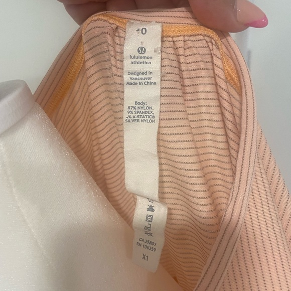 Lululemon Athletica sleeveless women’s top. Peach striped. Size 10. - Picture 3 of 3
